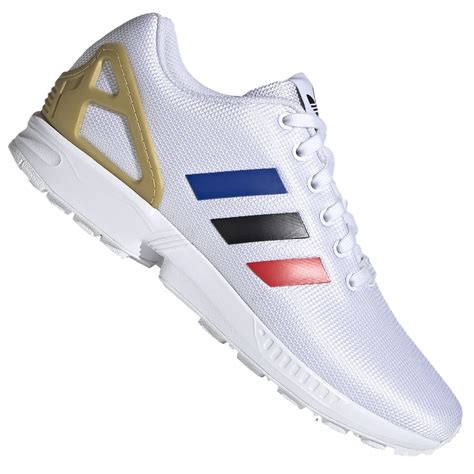 Weiße, goldene adidas ZX Flux 